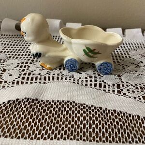 Vintage baby chick pulling an egg cart circa 1962, 1970